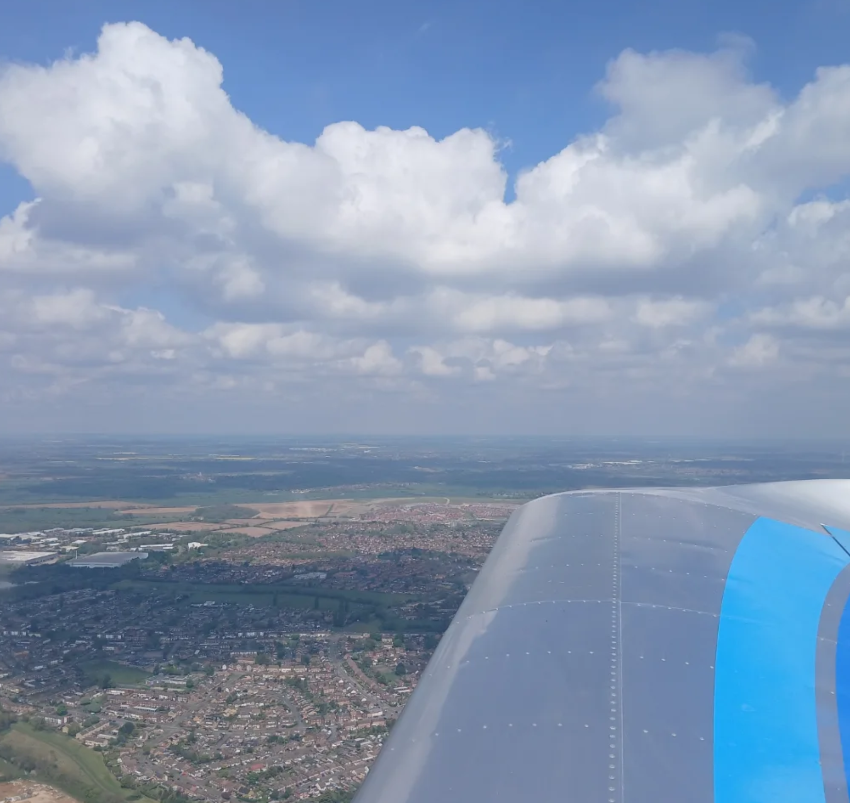 Aerial view over the countryside from the cockpit